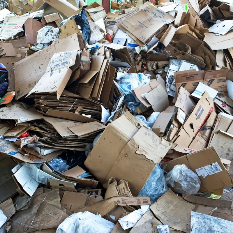 Paper and cardboard waste that can be shredded by double shaft shredder