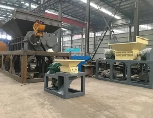 Multiple double shaft shredders in the factory workshop ready for quality inspection.