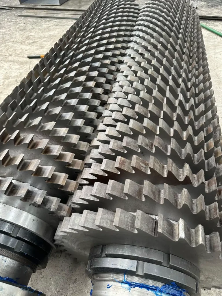 Chevron-style blade pattern on 2000 model double shaft shredder for consistent metal shredding